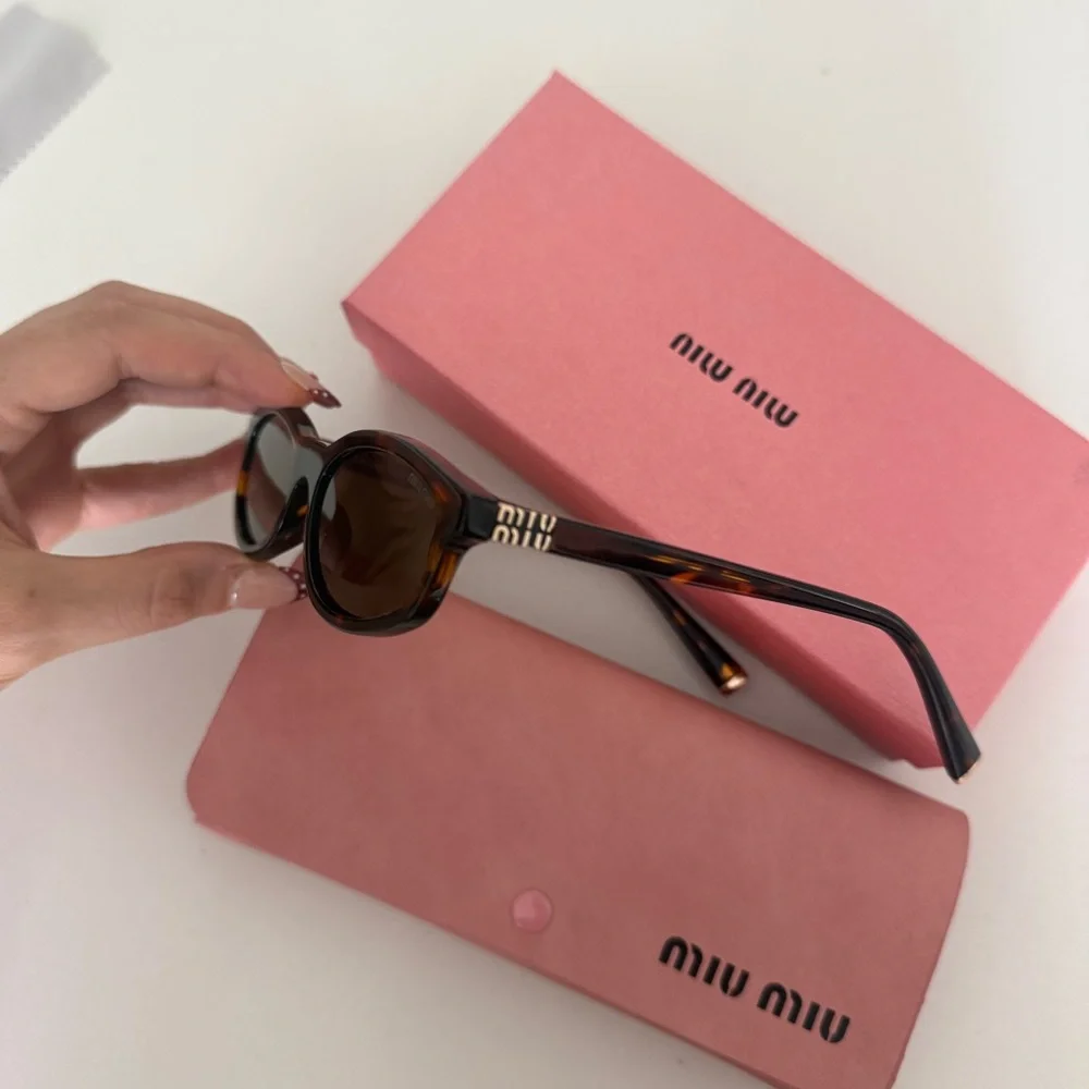 Miu Miu Regard Tortoiseshell Sunglasses